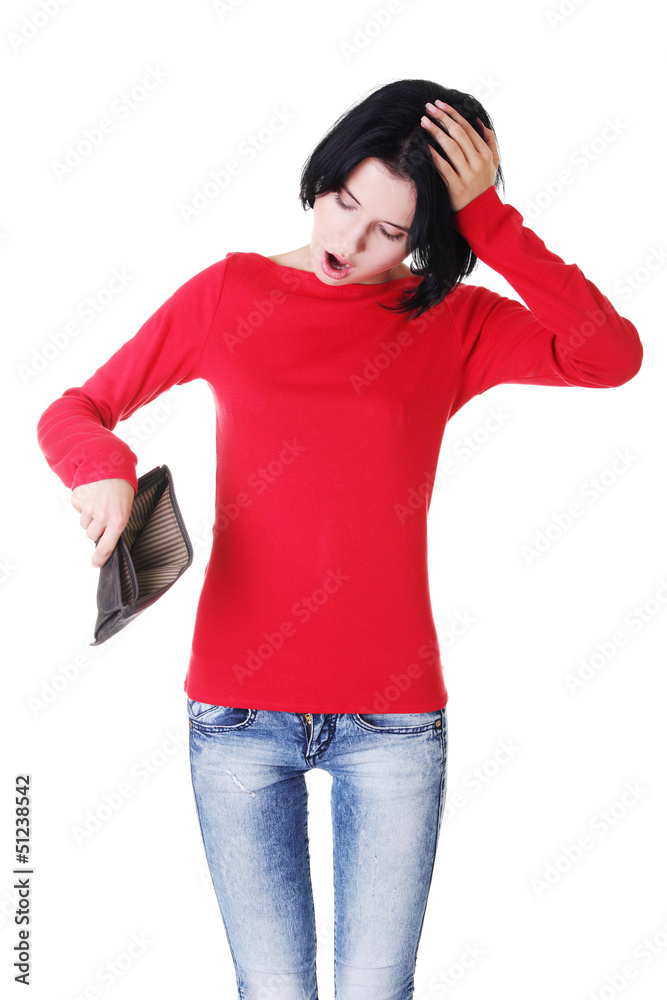 Young woman shows her empty wallet. Young woman shows her empty wallet.