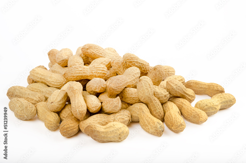 Many peanuts in shells on a white background Many peanuts in shells on a white background