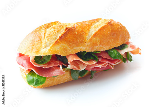 Crispy baguette with ham and basil