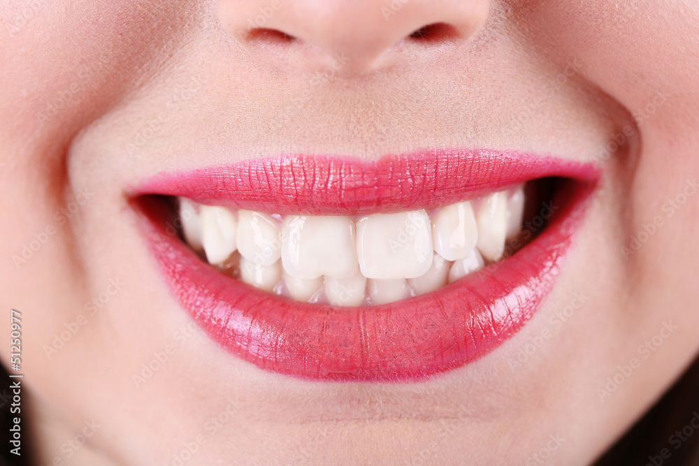 Woman smiling, close up Woman smiling, close up