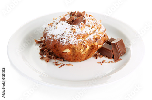 Tasty muffin cake with powdered sugar and chocolate