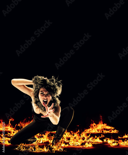 Woman surrounded by fire