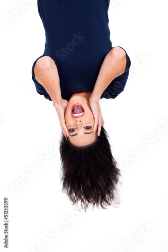 upside down photo of beautiful young woman photo