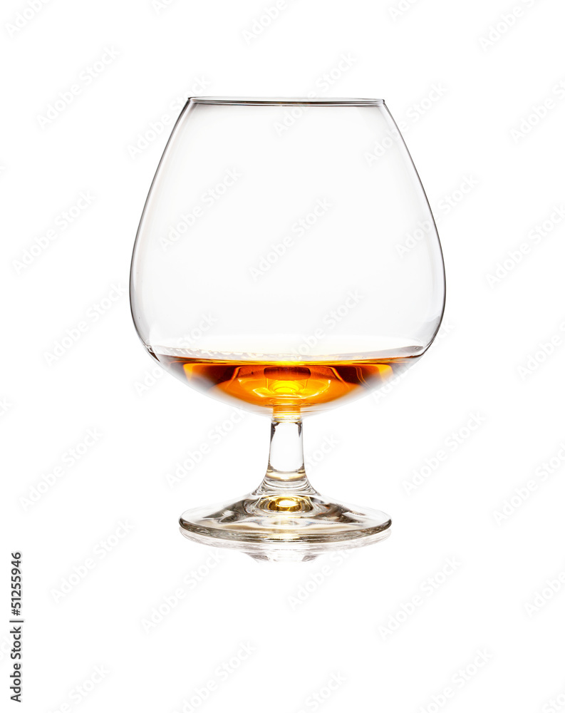 Glass of cognac or whiskey isolated on white background Glass of cognac or whiskey isolated on white background