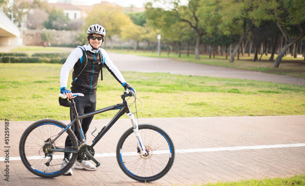 Fototapeta premium Happy Young Male Cyclist