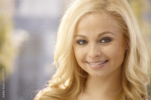 Closeup portrait of beautiful blonde woman © nyul