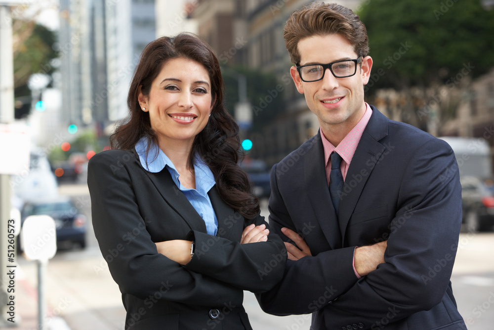 Portrait Of Businessman And Businesswoman Outside Office Portrait Of Businessman And Businesswoman Outside Office