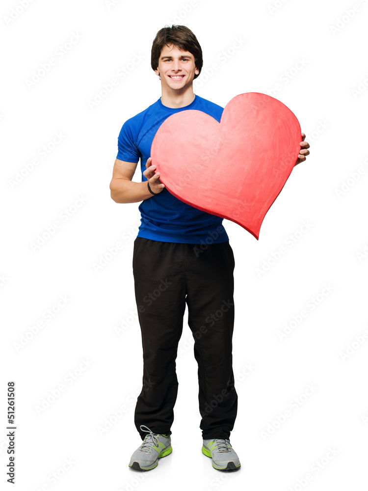 Young Man Holding Heart Shape Sign Young Man Holding Heart Shape Sign