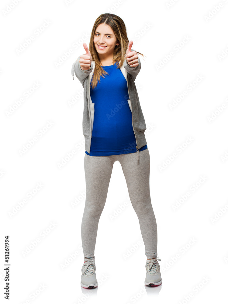 Young Woman With Thumbs-up Sign Young Woman With Thumbs-up Sign