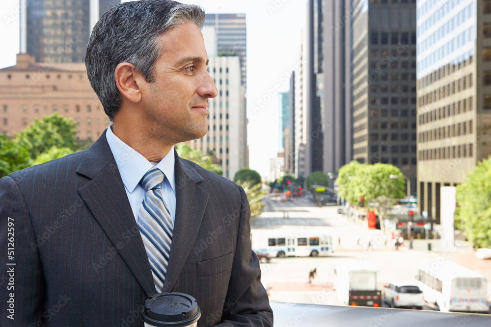 Businessman Drinking Takeaway Coffee Outside Office Businessman Drinking Takeaway Coffee Outside Office