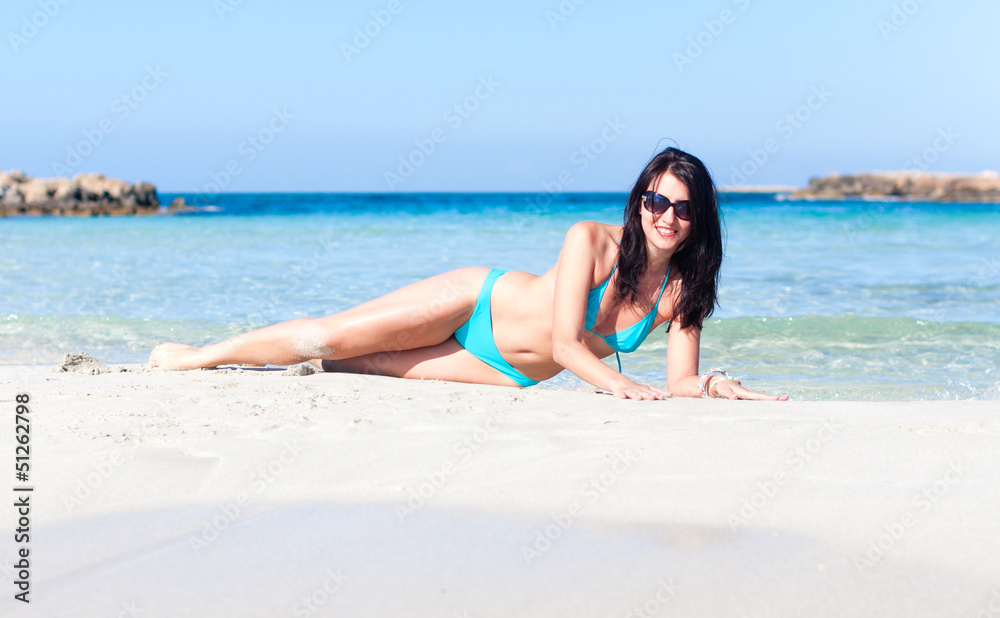 woman lying on the beach
