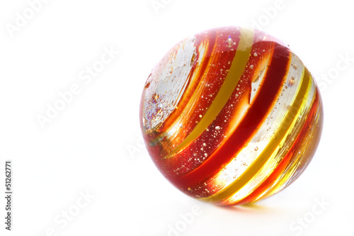 Striped glass marble on white