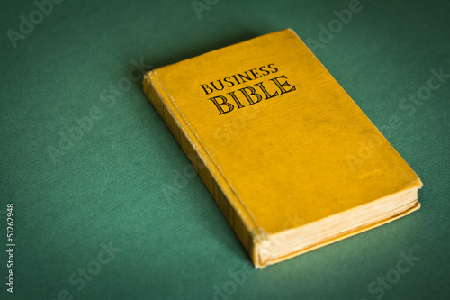 Vintage Business Bible with business commandments and rules