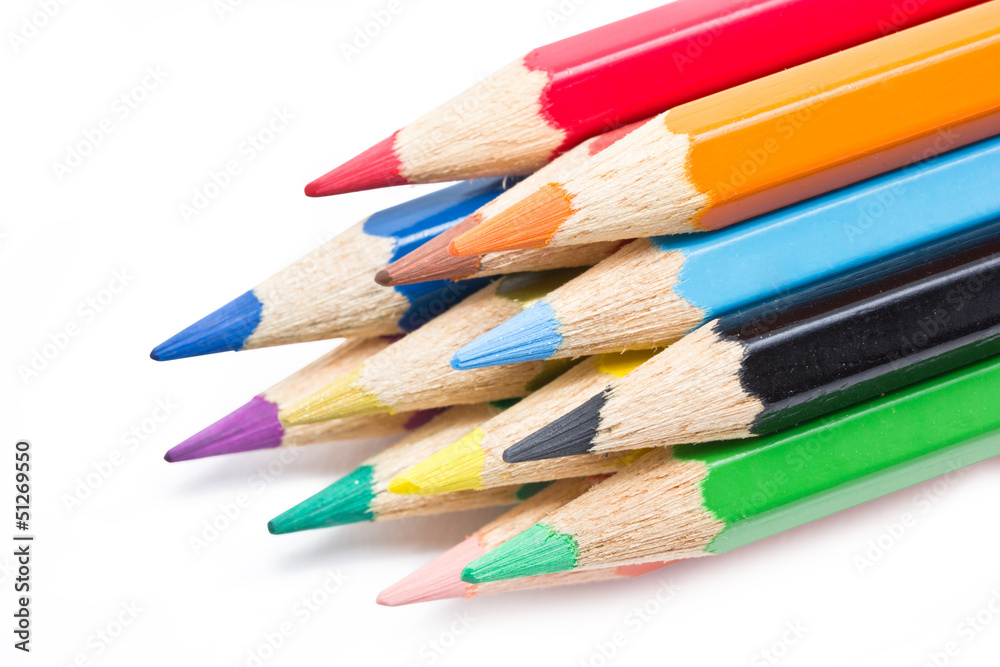 Close up of color pencils isolated on white background. Close up of color pencils isolated on white background.