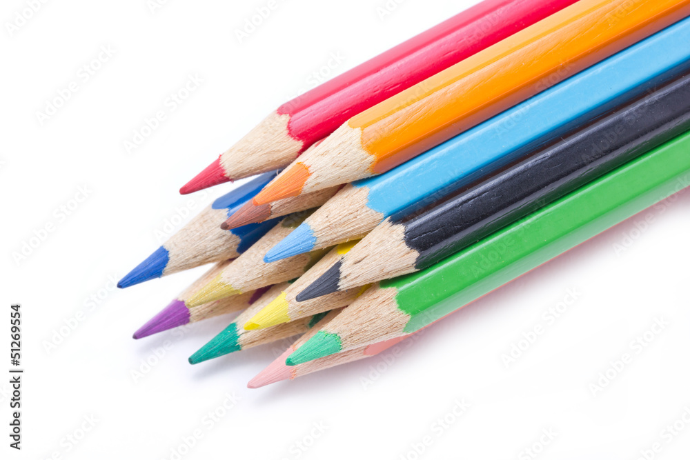 Close up of color pencils isolated on white background. Close up of color pencils isolated on white background.