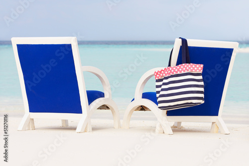 Fototapeta Naklejka Na Ścianę i Meble -  Empty Chairs On Beautiful Tropical Beach