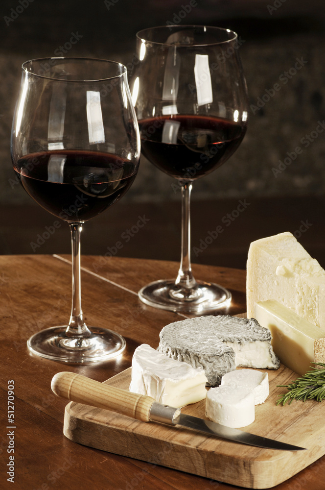 Two Glasses Of Red Wine And Cheese