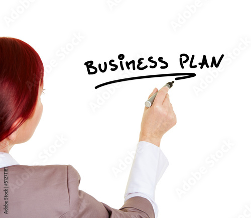 Frau schreibt das Wort Business Plan © Robert Kneschke