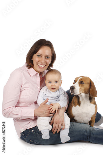 Obraz na plátně Glückliche Mutter mit Baby und Hund