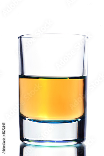 Close up of shot alcohol drink on white background