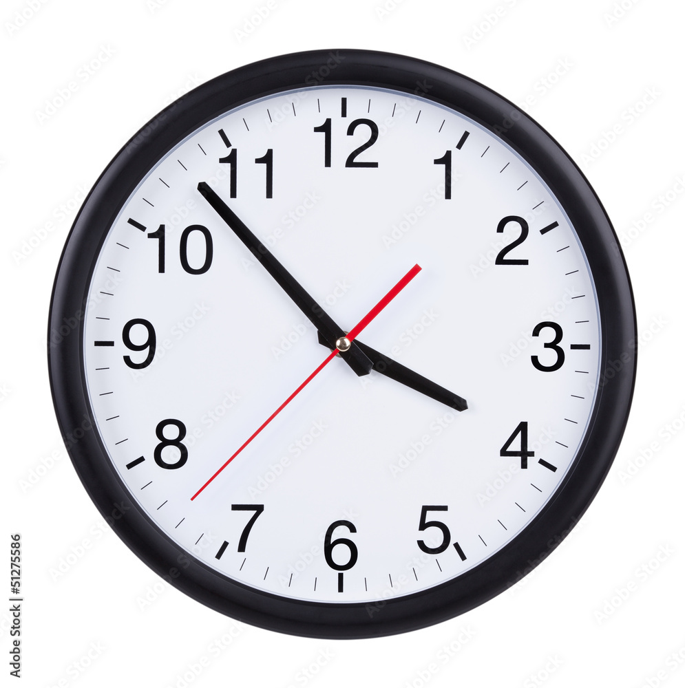 Office clock shows five minutes to four Office clock shows five minutes to four