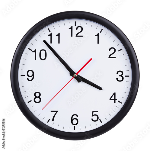 Office clock shows five minutes to four
