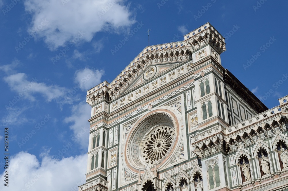 Santa Maria del Fiore rose window in clear sky, Florence