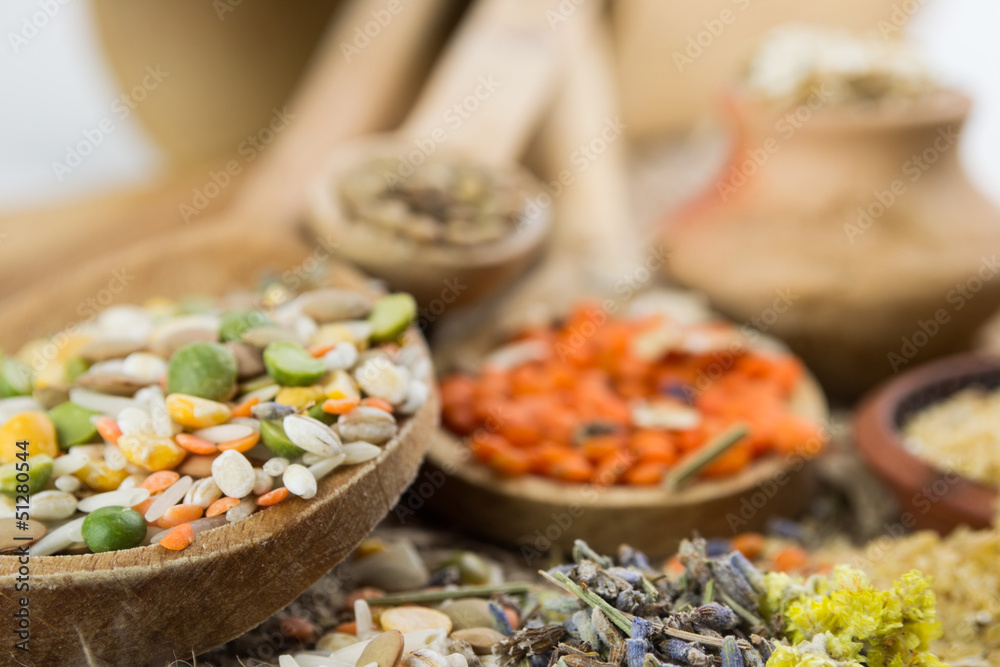 Wooden spoons with different kinds of groats Wooden spoons with different kinds of groats