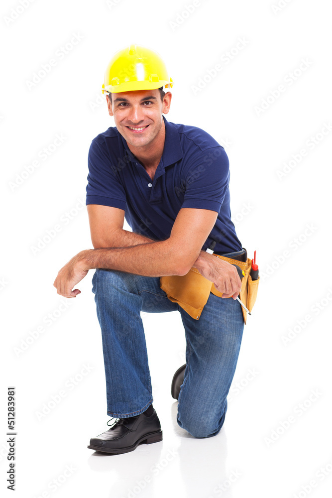 male constructor kneeling