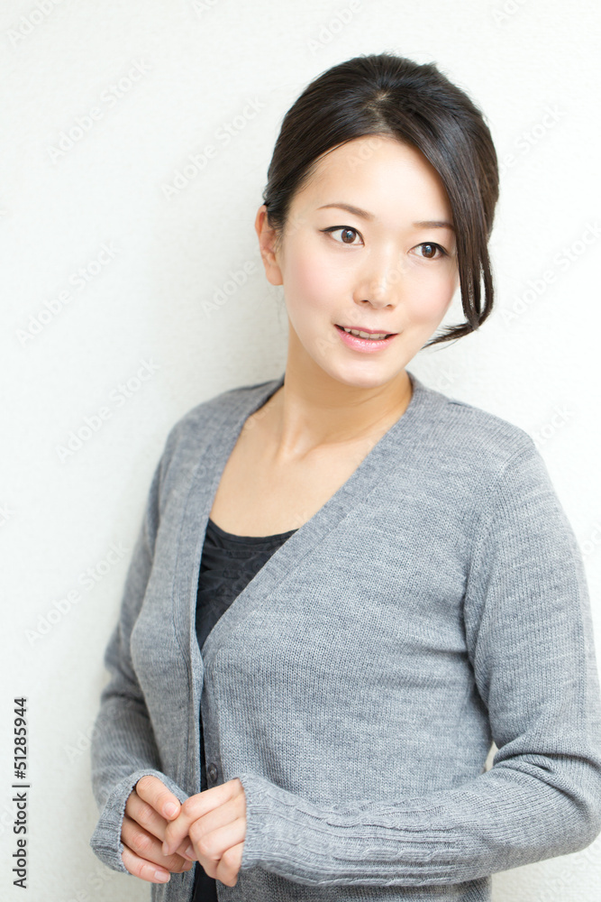 Beautiful asian woman relaxing on white background Beautiful asian woman relaxing on white background