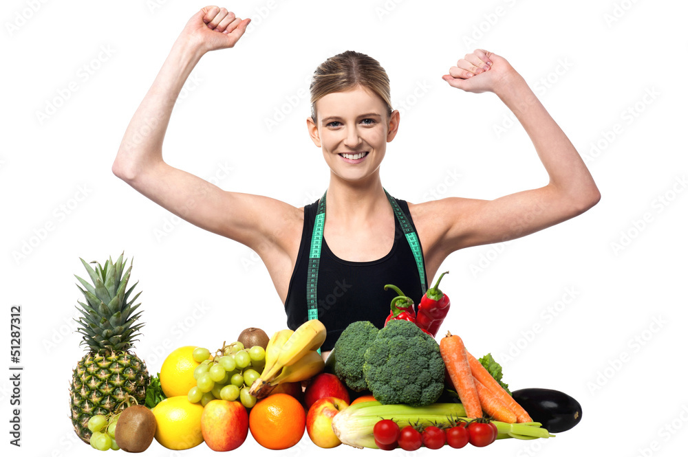 Happy teenager with fruits and vegetables Happy teenager with fruits and vegetables