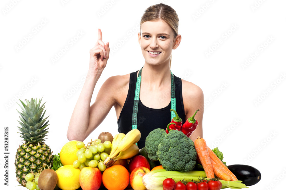 Pretty slim girl with fruits and vegetables Pretty slim girl with fruits and vegetables