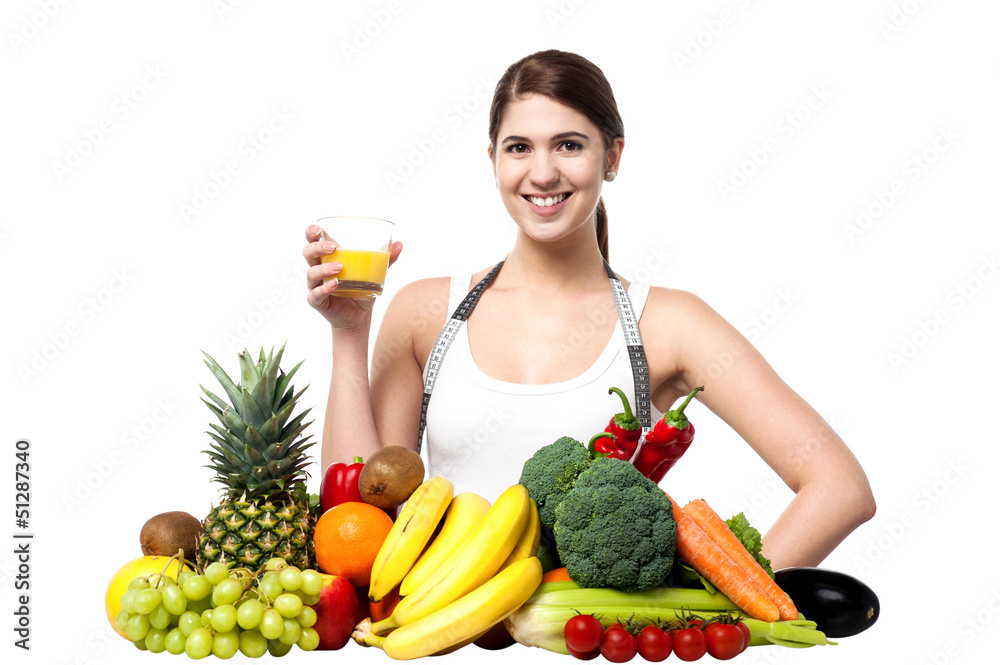 Young woman with fruits and glass of juice Young woman with fruits and glass of juice