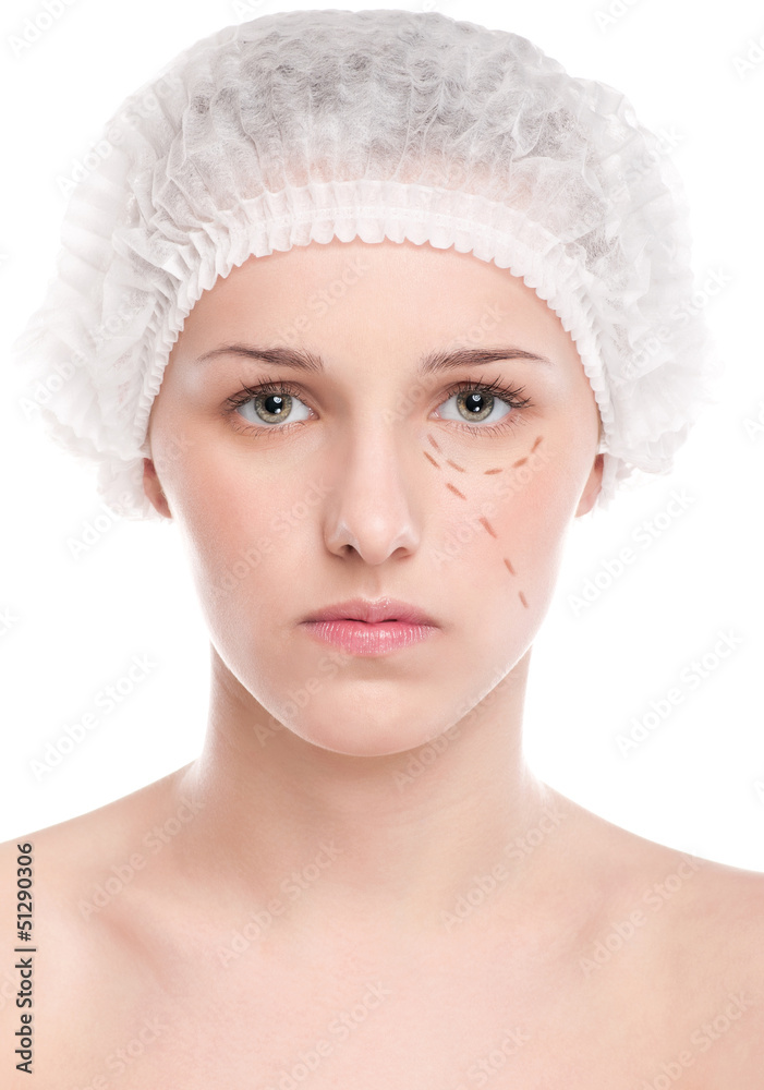 Beautician draw correction lines on woman face Beautician draw correction lines on woman face