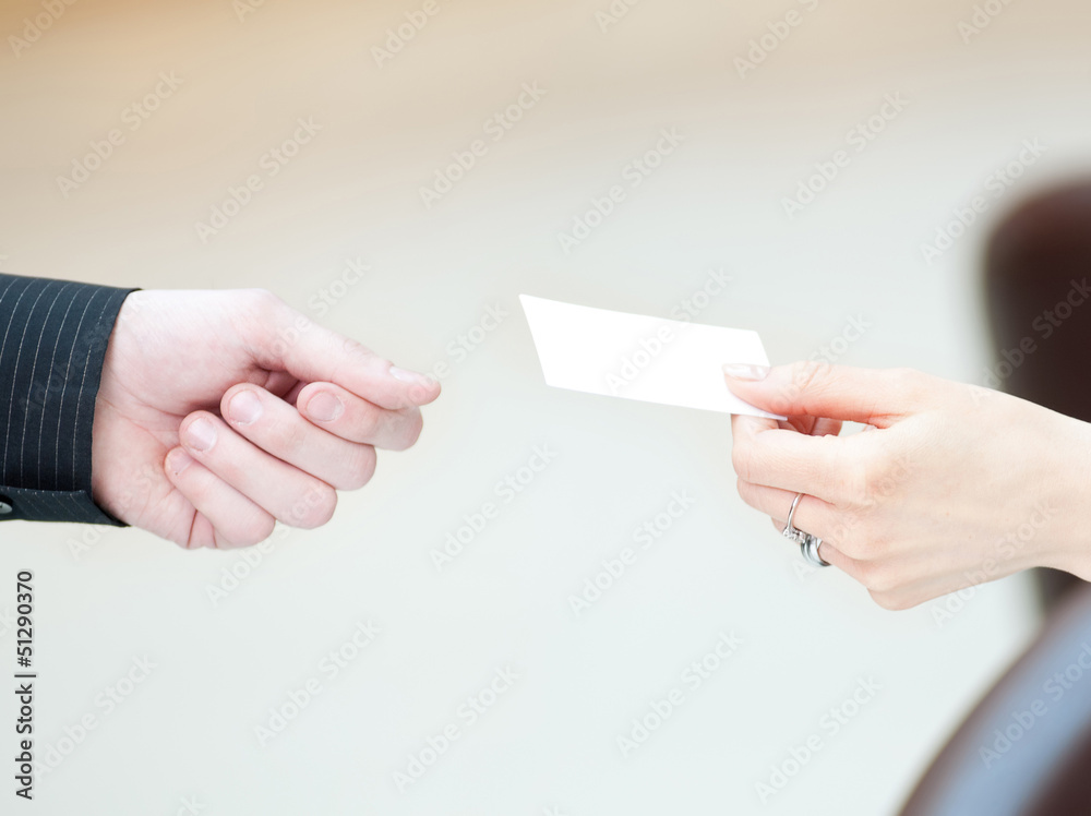 Exchange business card between man and woman. Exchange business card between man and woman.