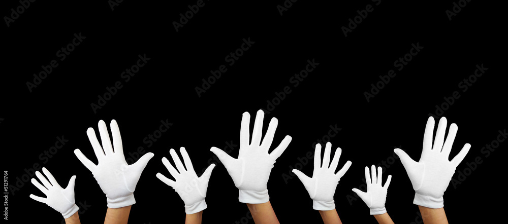 Fototapeta premium a lot of white hands against black background