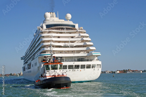 giant cruise ship for the transportation of passengers pulled by © ChiccoDodiFC