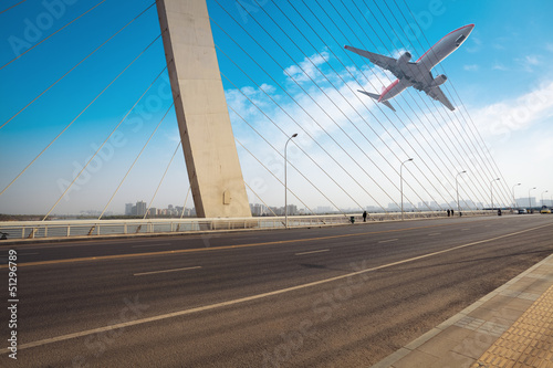 cable stayed bridge with airplane