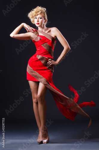Woman in nice dress in studio