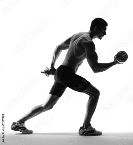 Foto muscle model guy exercise over white background.