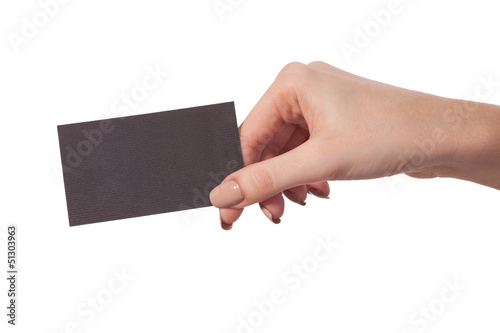 Businesswoman's hand holding blank business card