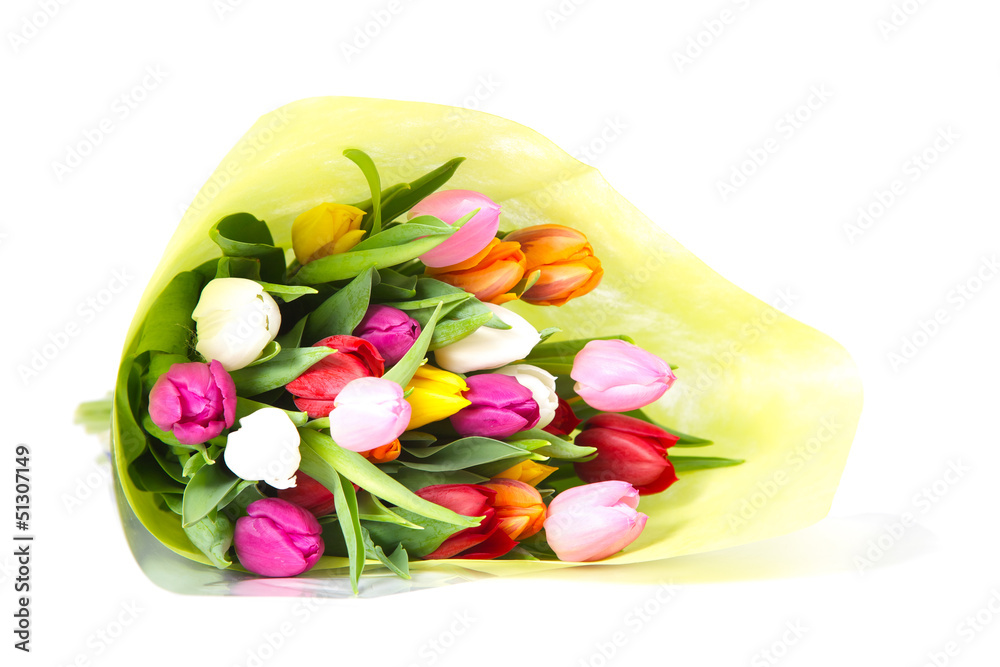 Colorful tulips wrapped in giftpaper isolated on a white backgro