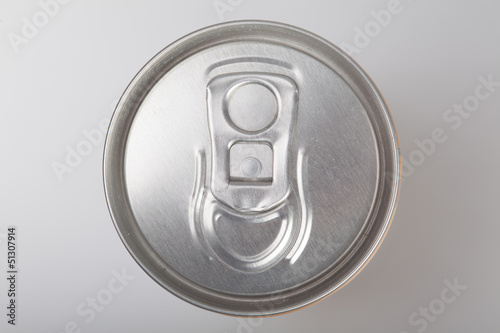 Blank aluminum soda can on a aluminum background