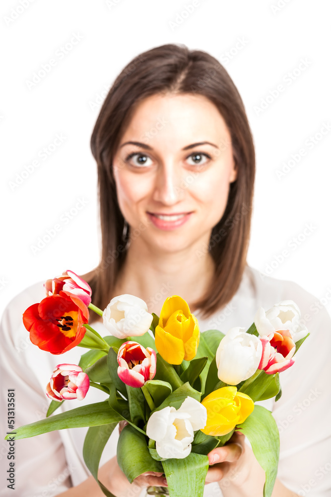 Beautiful young woman holding tulips isolated on white Beautiful young woman holding tulips isolated on white