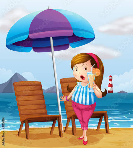 A fat lady holding a glass of juice at the beach