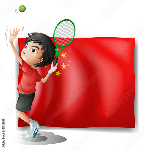 A boy playing tennis in front of the Chinese flag