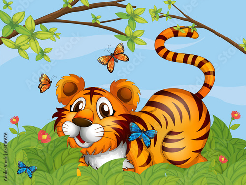 A tiger with butterflies in the garden