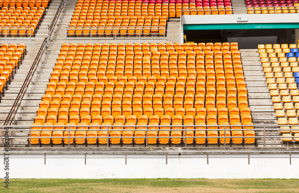 Naklejka premium Rows of empty plastic stadium seats