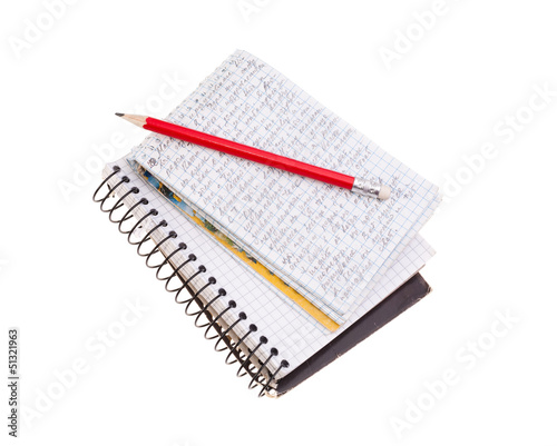 Fotografie Notebook with red pencil