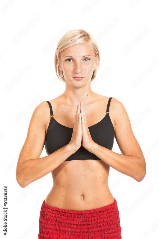 Practicing Yoga. Young woman isolated on white background Practicing Yoga. Young woman isolated on white background